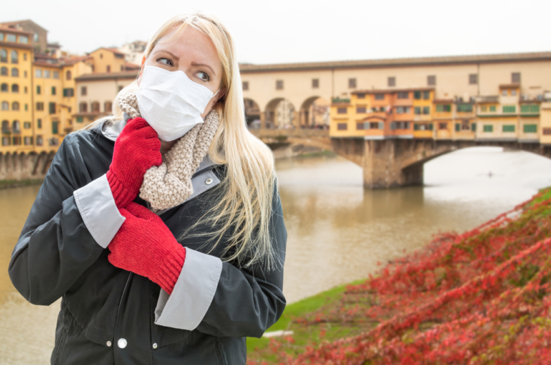 A woman wearing a mask in Italy during the covid-19 pandemic, for protection against coronavirus