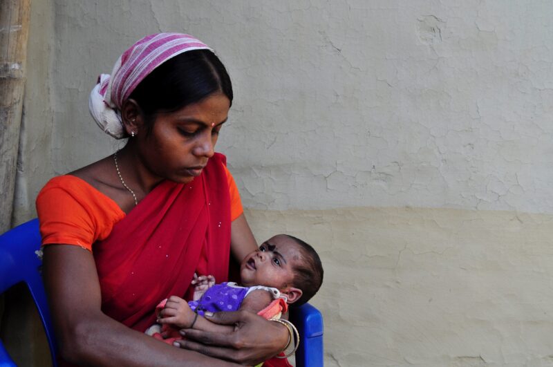 Indian mother holding a baby