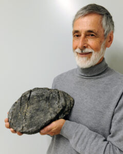 Fig. Heinz Furrer with the largest ichthyosaur vertebra